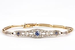 An Art Deco 15ct gold, diamond and sapphire line bracelet, the central panel mounted with three