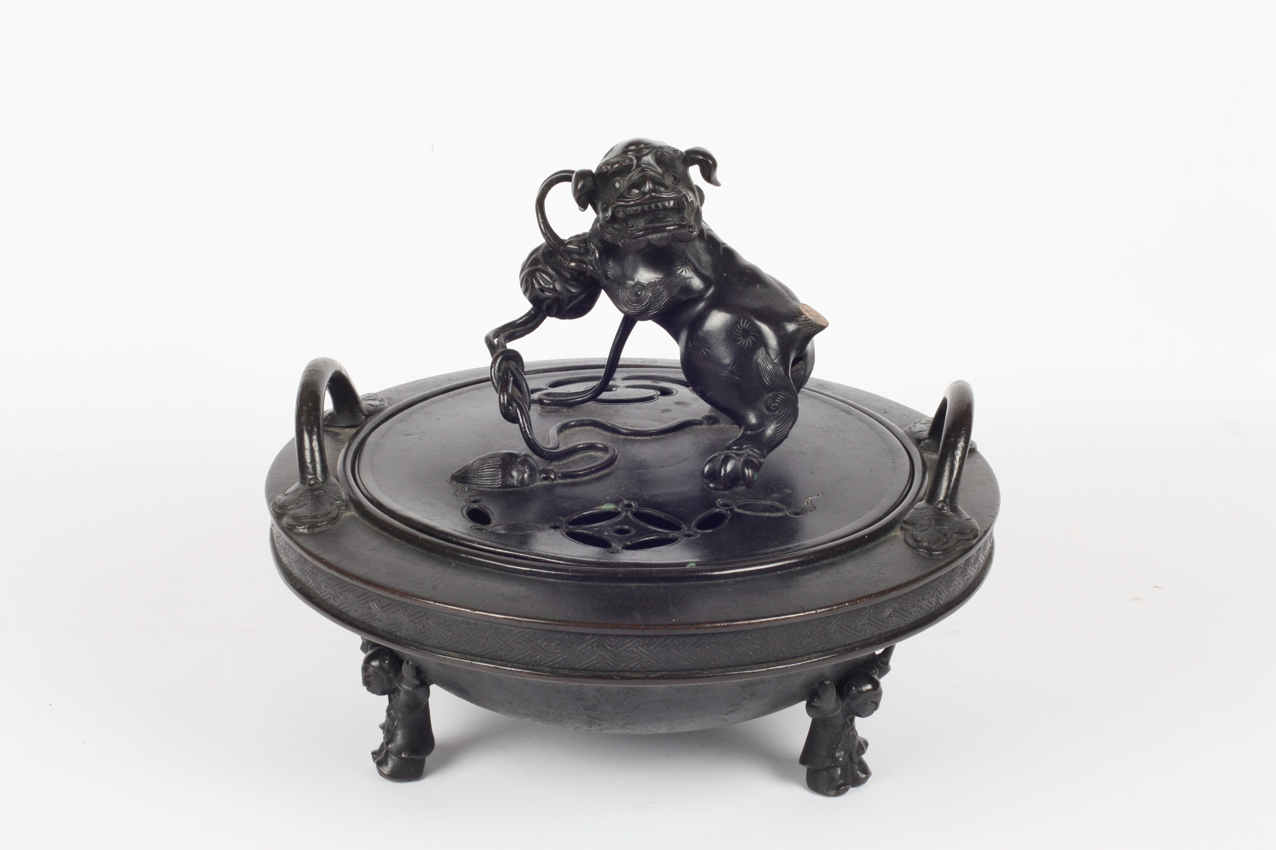 A late 19th/20th century Chinese bronze tripod censer, of circular form with upright loop handles,