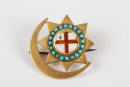 A 19th century 18ct gold and enamel sun and moon brooch, the sun mounted with a ring of turquoise