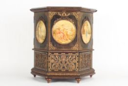 A 19th century French black lacquer and gilt tooled leather table cabinet, with ormolu mounts, the