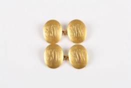 A pair of 18ct gold oval cufflinks, with engraved initials ?EDW?, 12.4 grams  Good condition.