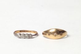 An 18ct gold and diamond four stone ring, and a gentleman?s 18ct and diamond ring, 4.4 grams. 4