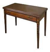 A George III mahogany foldover tea table, the plain top over a long single drawer with brass swan