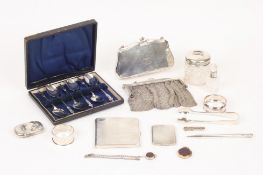 A collection of assorted silver items, comprising: a silver mesh purse London 1921, another silver