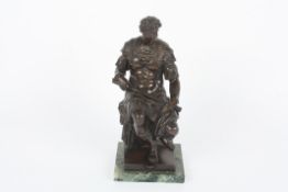 A bronze figure of a Roman figure, seated, on a marble plinth, stamped on the reverse 3506, height