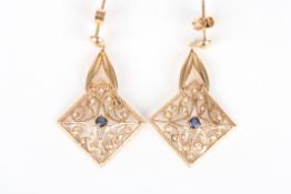 A pair of gold coloured metal drop earrings set with seed pearl and sapphires  Good condition