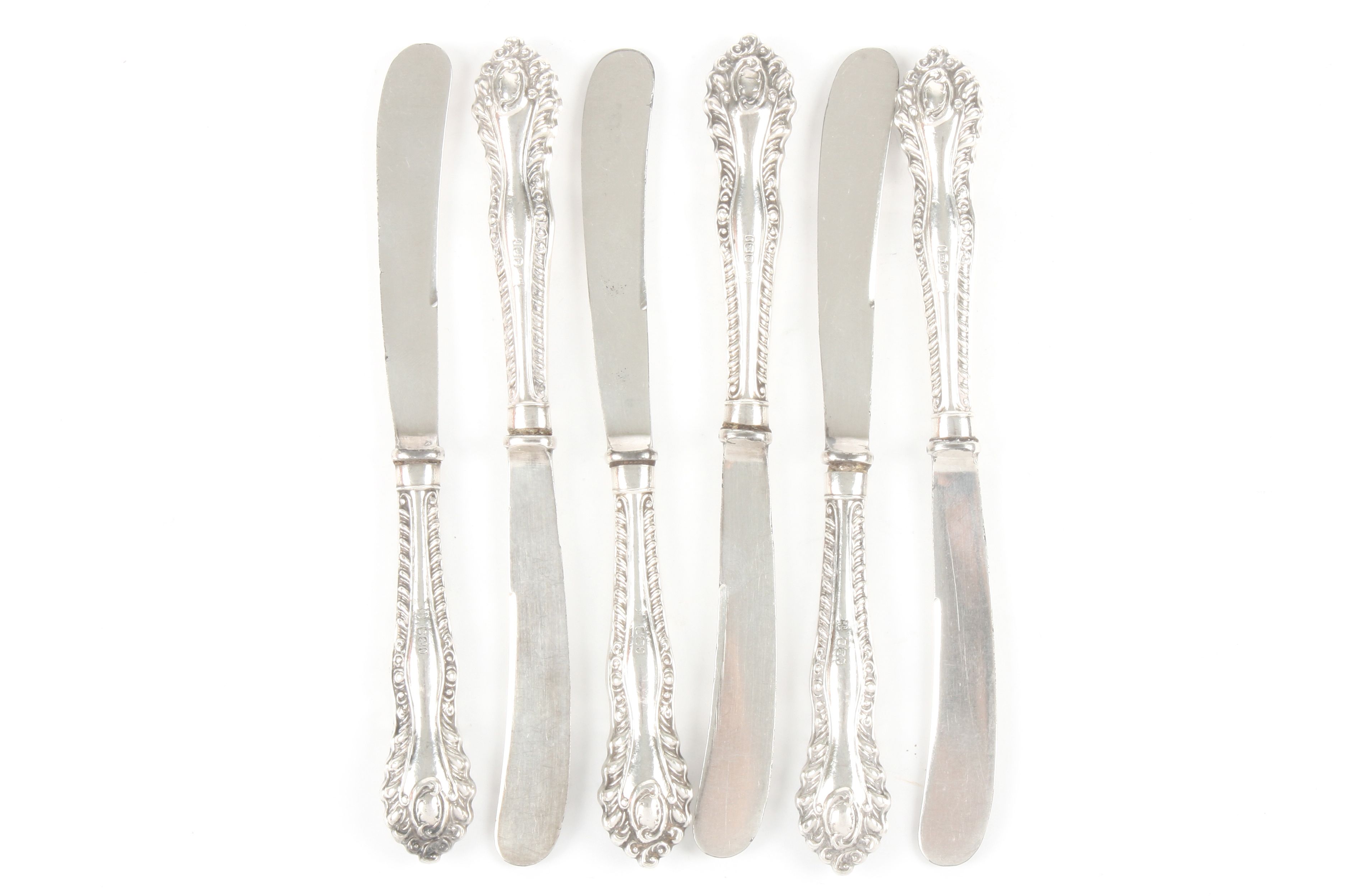 A large quantity of silver plated flat wear and a set of silver handled butter knives, early 20th