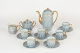 A 1930s/1940s Japanese Noritake coffee service, each piece decorated with linear designs in shades