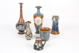 A collection of Royal Doulton stoneware, comprising five vases of various shapes and sizes and a