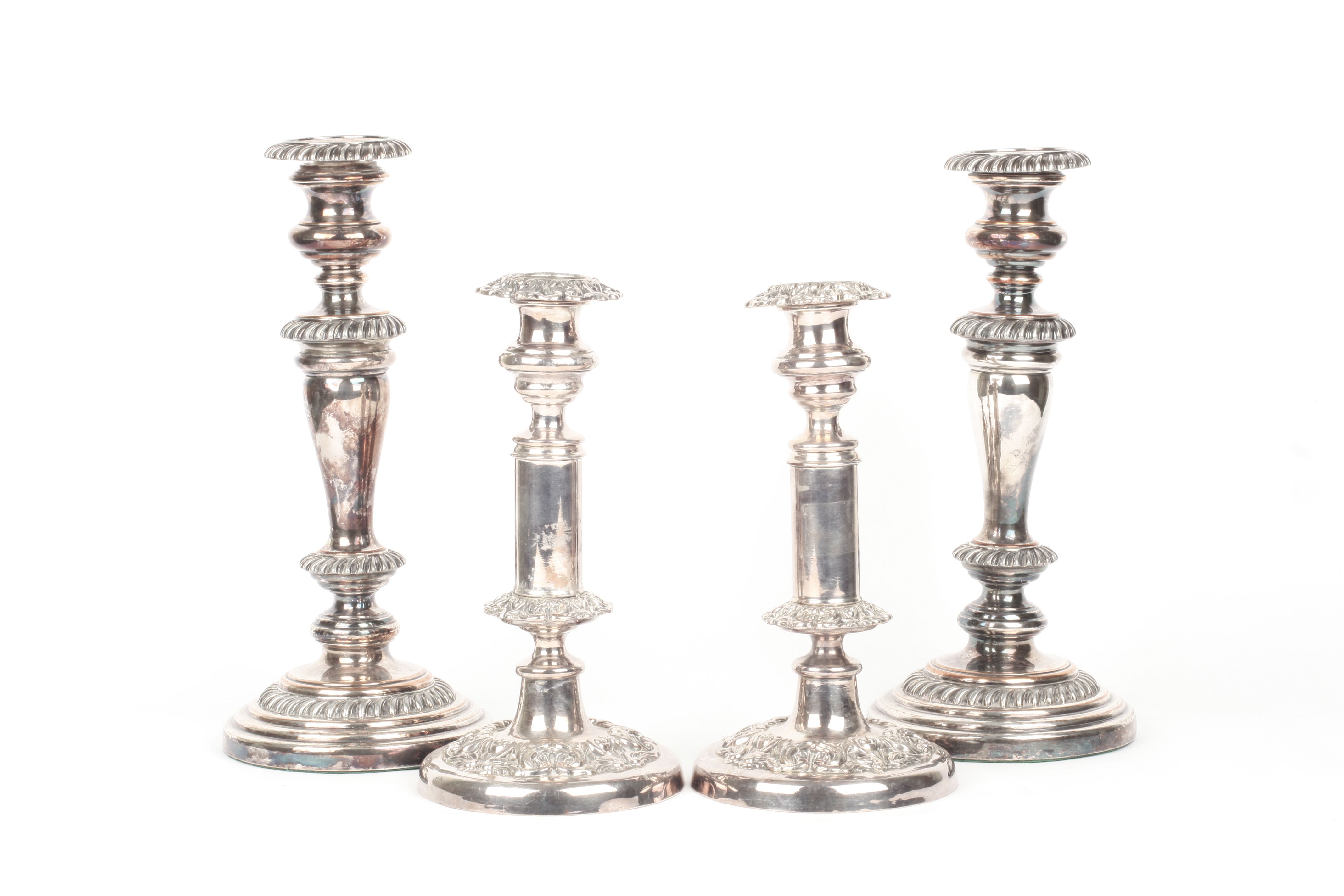 A pair of Victorian silver plated telescopic candlesticks, together with a pair of Old Sheffield
