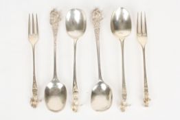 Two matched pairs of Georgian silver apostle spoons including Hester Bateman and a pair of forks,