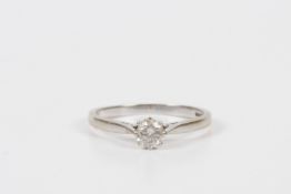An 18ct white gold and diamond solitaire ring, the single stone weighing approx. 0.33cts, set in a