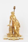 A large 19th century French ormolu figural lamp, signed ?Detziec?, formed as a lady in a flowing