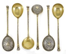 A set of six Russian silver gilt and Niello spoons, hallmarked Moscow 1869, with spiral twist stem