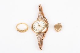 A 9ct rose gold ladies wristwatch, ring and pendant, the 9ct gold wristwatch on bracelet, with an