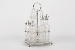 A large silver plated and glass cruet set, comprising six cut glass bottles within a silver plated