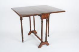 A mahogany Sunderland table, early 20th century, with butterfly leaves, turned legs, marquetry