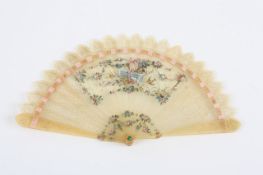 A Regency horn brise fan, the sticks pierced with floral decoration, and delicately painted with