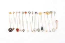 A collection of 28 assorted gold and silver tie and stick pins Most in good condition.