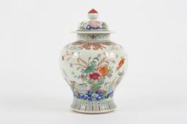 A 19th century Chinese famille rose ginger jar and cover, the body decorated all over with