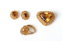 An 18ct gold and citrine brooch/pendant with matching earrings and ring, the heart shaped citrine