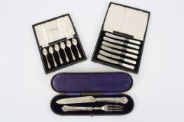 A Victorian silver knife and fork in presentation set, hallmarked Sheffield 1884, heavily engraved