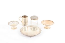 A collection of silver items including a salver, mug, two bon-bon dishes and a lidded jar, weight