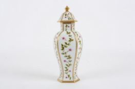 A Limoges porcelain six sided vase with cover, French, Modern, the `Belvedere` pattern vase