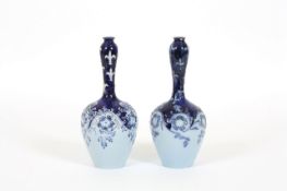 Two Macintyre & Co. Florian ware vases designed by William Moorcroft, dated 1898, with bulbous