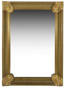 A large Victorian over mantel gilt wood mirror, with moulding to edge and acanthus leaves to