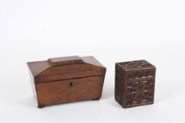 A 19th century sarcophagus shaped mahogany tea caddy, together with a Modern carved wooden playing