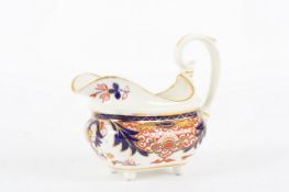 A Royal Crown Derby boat shaped jug, late 19th century, with large scroll handle, Imari decoration