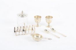 A silver breakfast set by Adie brothers, hallmarked Birmingham, 1930, comprising two egg cups and