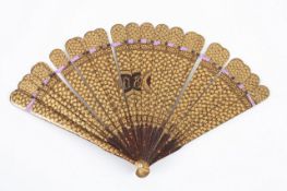 A Chinese lacquer wooden fan, probably late 19th century, both sides of the sticks decorated with