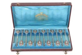 A fine set of twelve Russian silver and cloisonné enamel coffee spoons, Mark of Gustav Klingert,