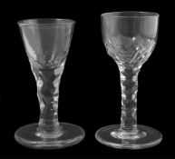 Two 18th century cordial glasses with facet-cut stems, one with cup-shaped bowl and rough pontil,