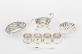 A small collection of silver, comprising a scallop shaped butter dish and knife hallmarked