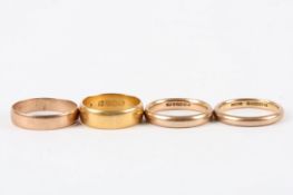 Four wedding bands, including one 22ct, two 9ct, and one gold coloured metal weight 22ct 5.3g,