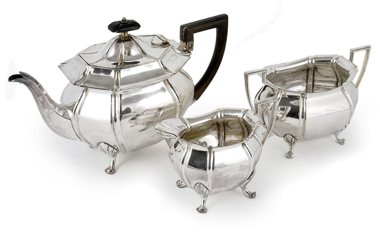 A three piece silver plated Mappin and Webb tea set, comprising a sugar basin, milk jug and teapot