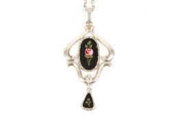 A silver and enamel Charles Horner pendant, the sterling silver pendant with oval black enamel