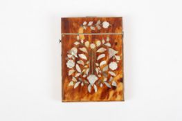 A 19th century tortoiseshell and mother of pearl card case, the rectangular shaped case covered with