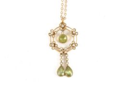 An Edwardian peridot and seed pearl pendant on 9ct gold chain, the pendant mounted with seed