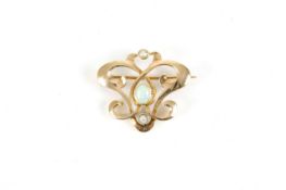 A Murrle Bennett & Co. 15ct gold opal and seed pearl brooch, with opal to the centre and seed