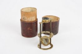 A simple Withering-type cylinder brass microscope by Rubergall, circa 1805, contained within a