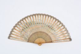 A wooden and hand painted Japanese fan, depicting temples, a boating scene, flowers, trees etc, with