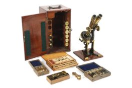 A Henry Crouch brass compound binocular microscope with accessories, late 19th century, signed on