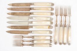A set of seven Edwardian silver and mother of pearl knives and forks, the handles hallmarked