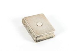 A silver vinaigrette in the form of a book, hallmarked London, 1812, with makers initials, opening