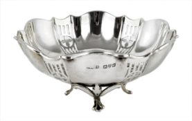 A silver Chester bon-bon dish, hallmarked 1917, with fluted rim, pierced bowl, raised on three