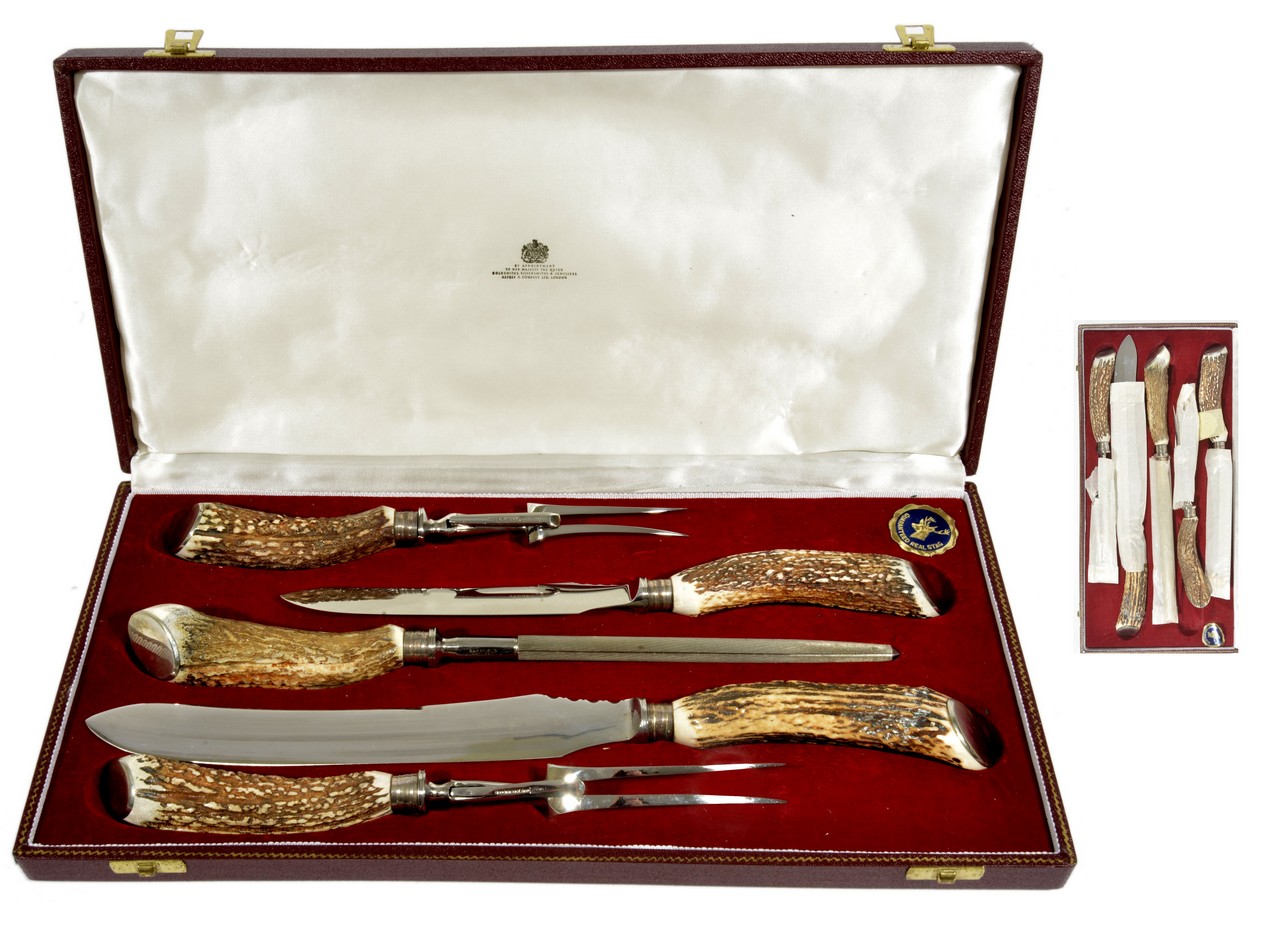 A silver plated and stag handled carving set by Asprey & Co. London, Modern, in fitted red box, in